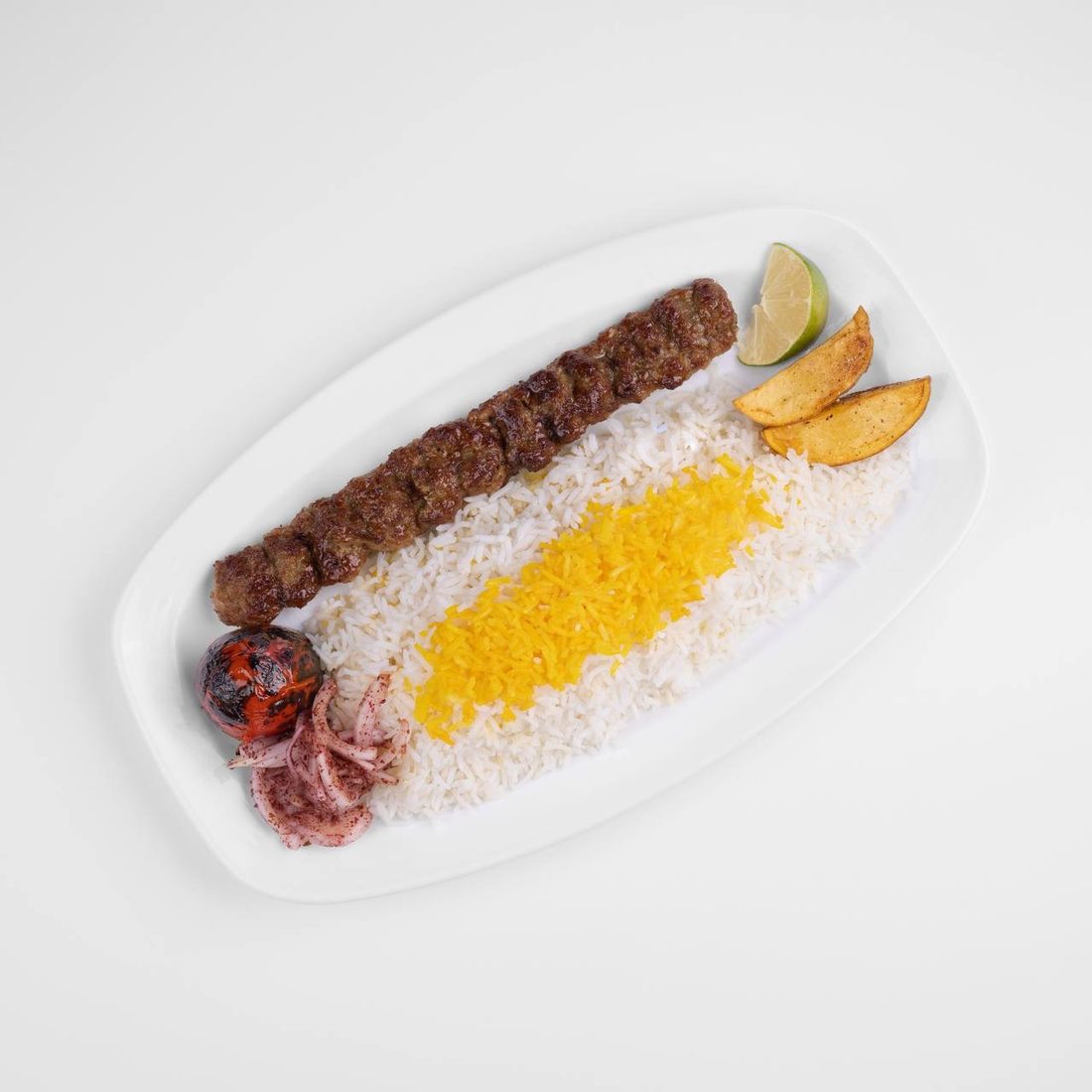 Kabab Koobideh — persischer Hackfleischspieß mit Reis